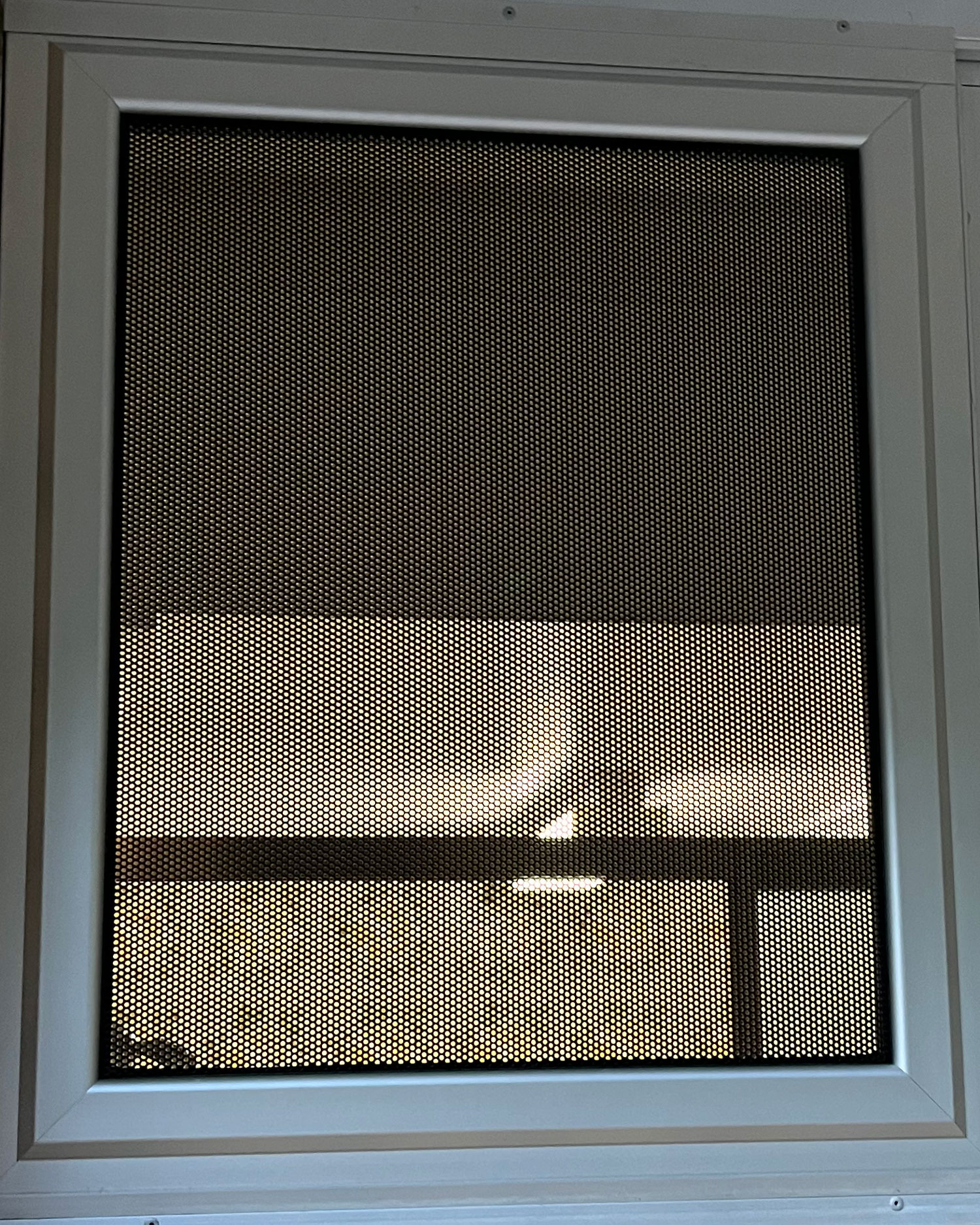 Perforated budget security screen window